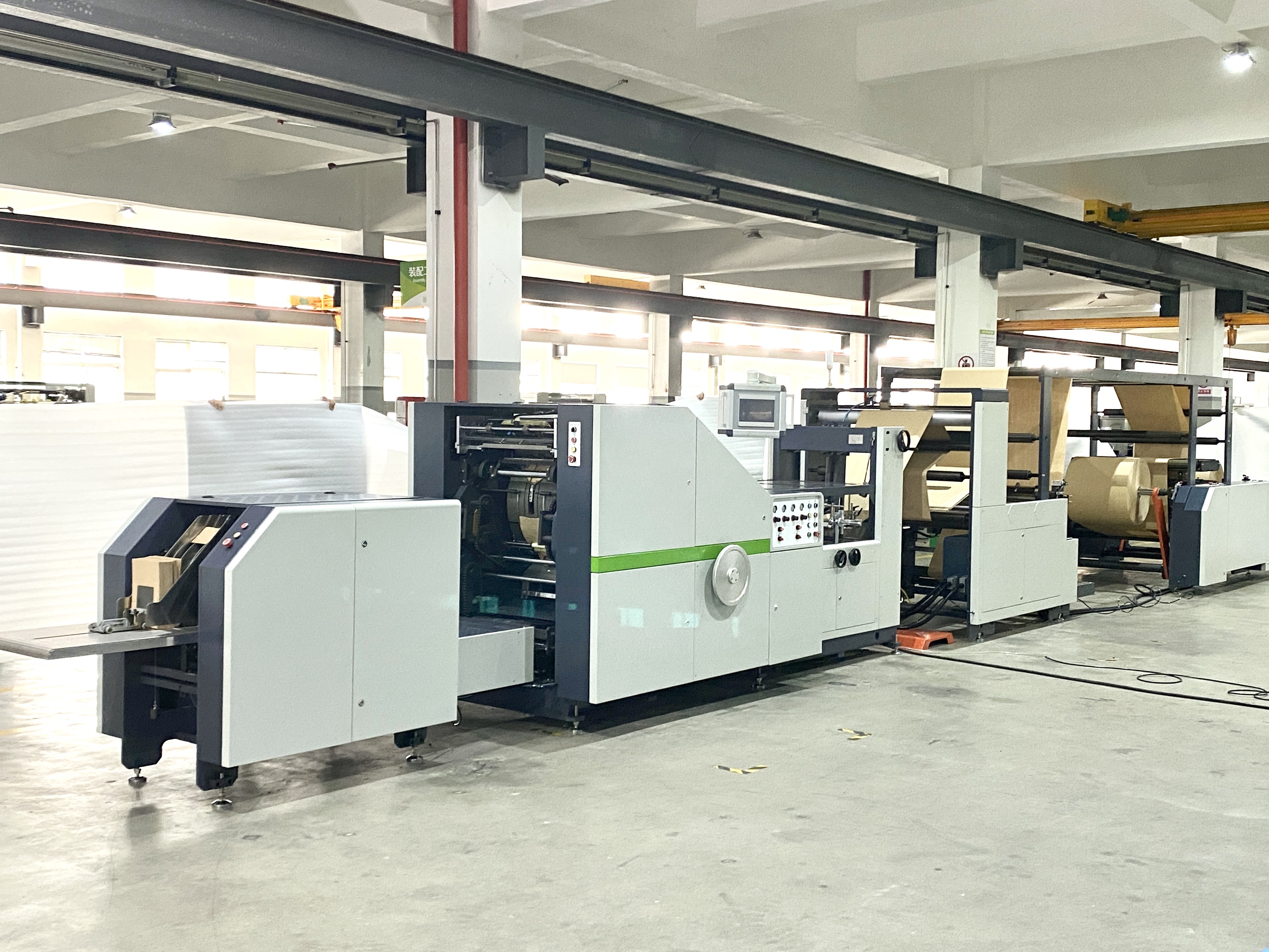 Roll Feeding Paper Bag Machine: Enhancing Packaging Efficiency